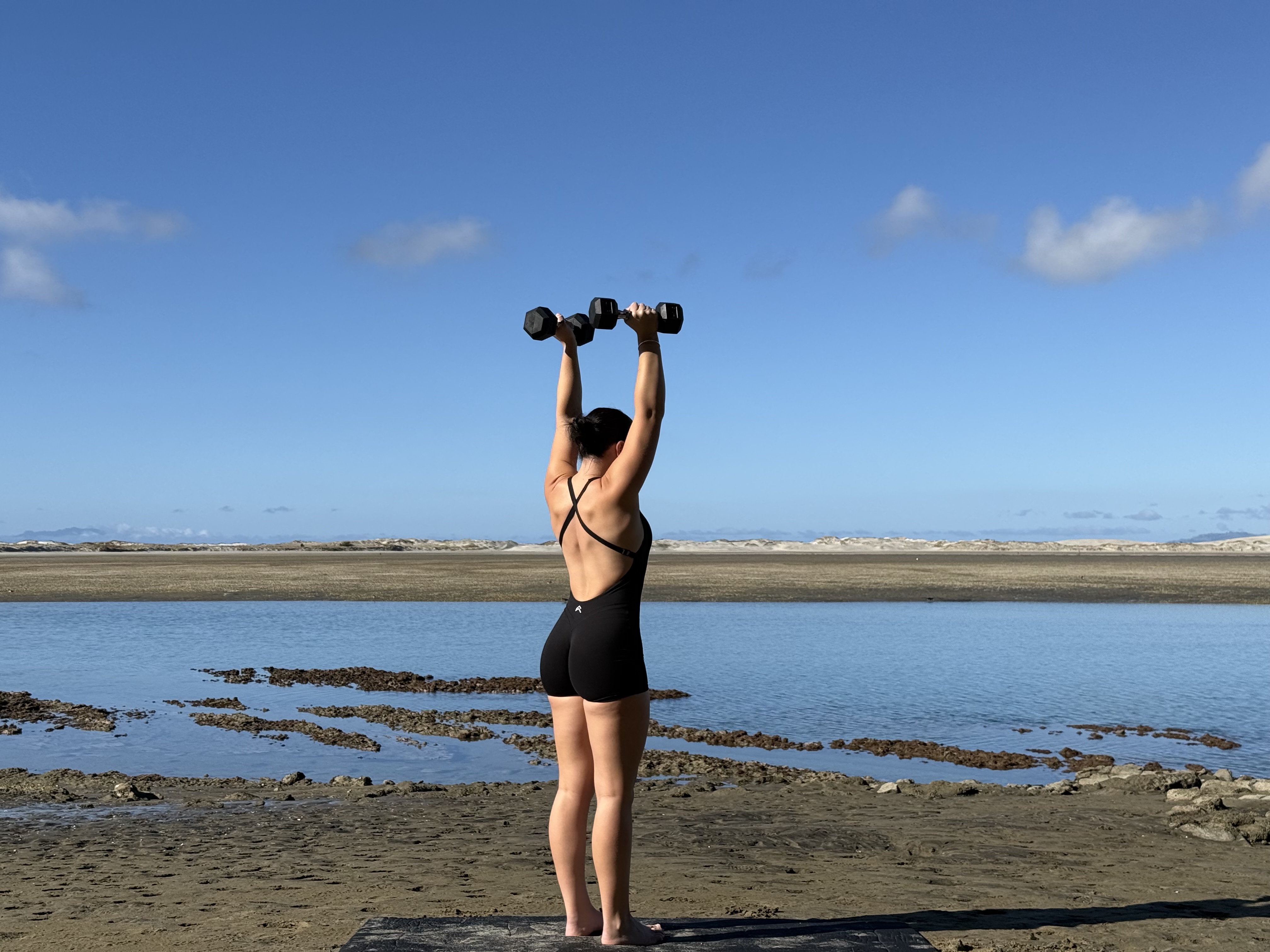 Kate training on the New Zealand coast at the estuary